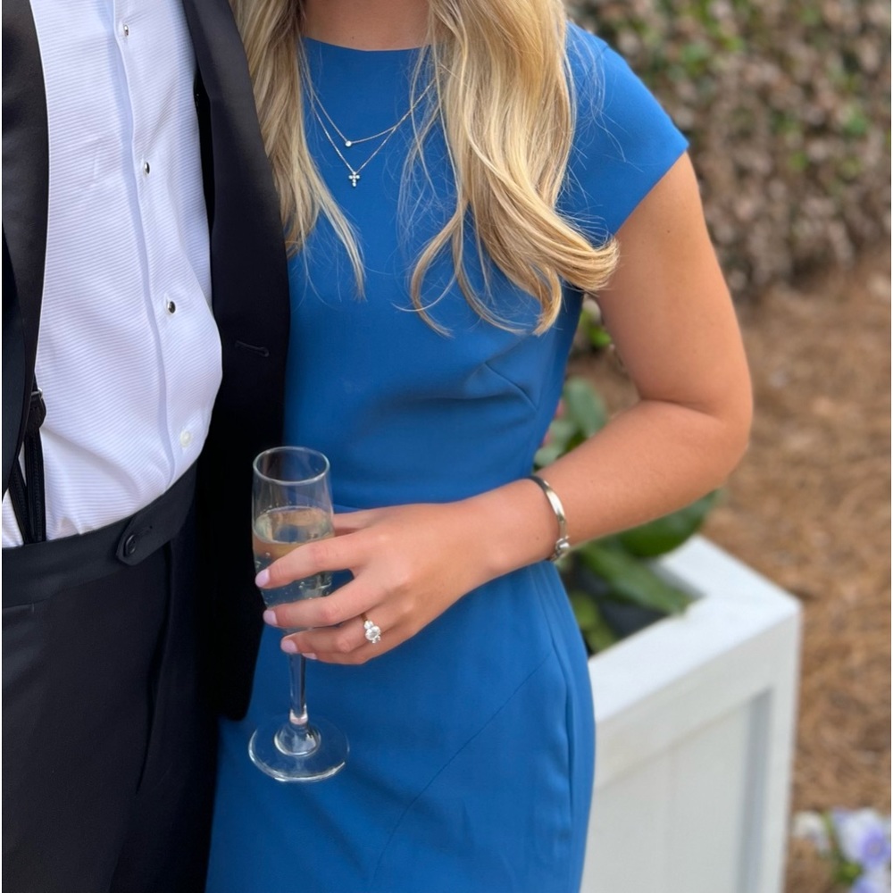 Dessy bridesmaid dress: dusk blue cap sleeve trumpet gown